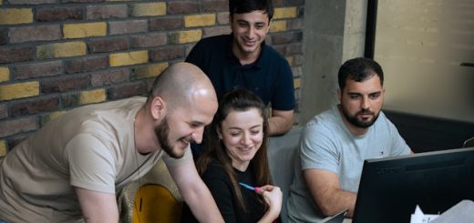 Group of software developers on project management